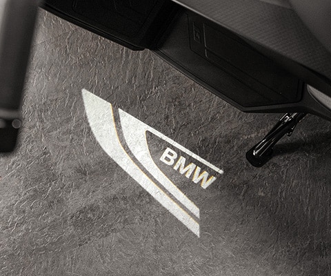 The C 400 GT from BMW Motorrad with floor lighting and logo projection